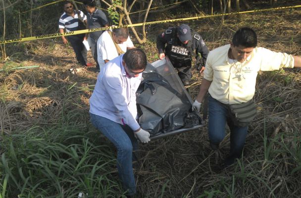 Un descuartizado y un policia asesinado en Veracruz, reportan Ejecutado-minatitlan