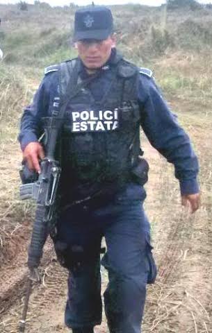 Este policia fue el primero en amenazar a Daniel Orozco por haber tomado imágenes de la fosa clandestina/ Foto. J.Valencia