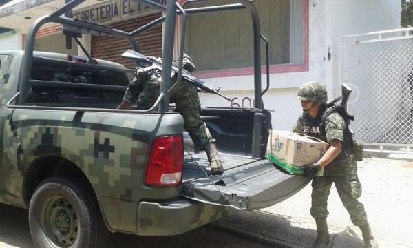 Por tierra, transportaban en trailers por carretera en Coatzacoalcos 57 kilos de cocaina pura/ Foto Plumas Libres