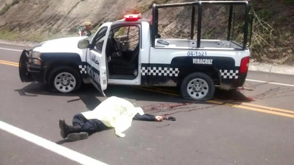 Sin darles oportunidad a nada, fueron asesinados los policias/ Foto Plumas Libres